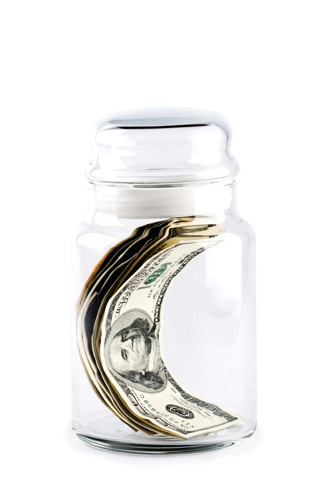 person saving money in piggy bank